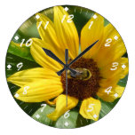 Abeille de travailleur sur le tournesol horloges murales