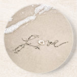 Amour dans les caboteurs de plage de sable dessous de verre