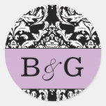 Autocollant de monogramme de damassé