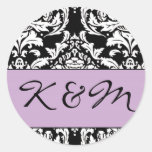 Autocollant de monogramme de damassé