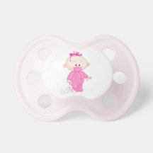 Bébé dans la tétine rose