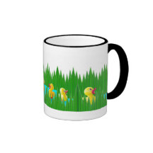 Canards dans l'herbe de sushi tasse