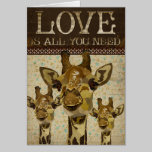 Carte de voeux d'amour de girafes de damassé d'or cartes