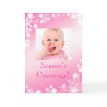 Carte rose de vacances de flocons de neige de phot