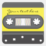 Cassette jaune avec l'autocollant de bande d'arc-e