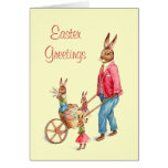 Chariot mignon de famille de lapin et d'oeuf de pâ cartes