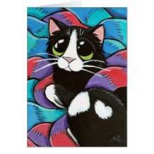 Chat de smoking se reposant sur la carte d'art d'é