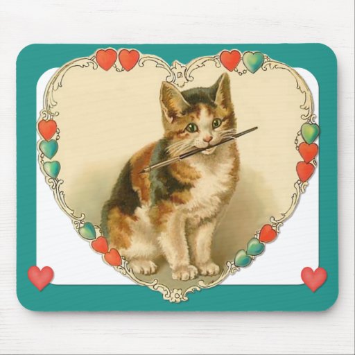 Chaton de calicot au coeur tapis de souris