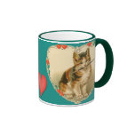 Chaton de calicot au coeur tasse