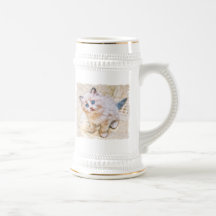 Chaton siamois avec les yeux bleus émouvants mugs