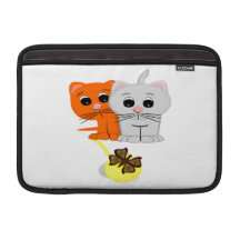 Chatons avec le fil poches macbook air