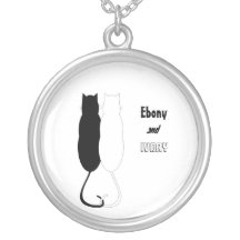 Chats de bois d'ébène et d'ivoire bijouterie personnalisée