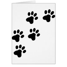 chienchien mignon noir de pattes de chien carte de vœux