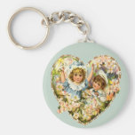 Coeur floral de garçon et de fille porte-clé