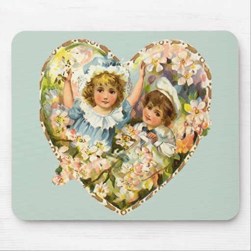 Coeur floral de garçon et de fille tapis de souris