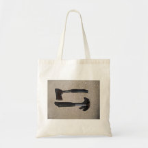 Cognée et marteau dans l'affichage sac en toile