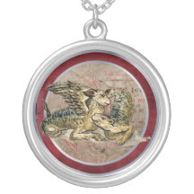 Collier/amulette de dragons de bébé