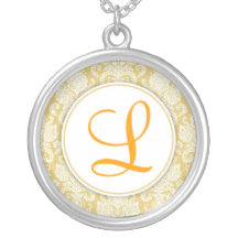 Collier de monogramme de damassé