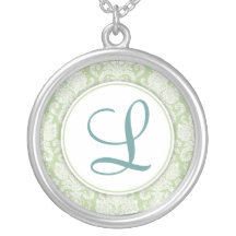 Collier de monogramme de damassé