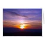 Coucher du soleil sur la longue traînée carte de vœux