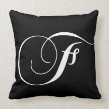 Coussin décoré d'un monogramme de concepteur blanc