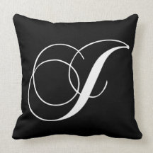 Coussin décoré d'un monogramme de concepteur blanc