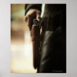 Cowboy avec l'arme à feu dans l'étui posters