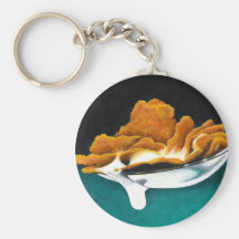 Cuillerée de la peinture de céréale et de lait porte-clefs