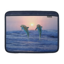 Dauphins au lever de soleil poche macbook air