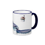 Dauphins de Bottlenose et tasse de pélican