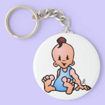 De jongenszitting van het baby sleutelhangers