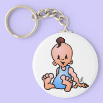 De jongenszitting van het baby sleutelhangers