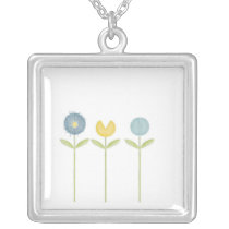 drie krabbelbloemen kettingen
