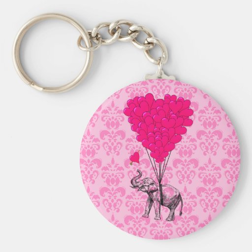 Éléphant tenant le coeur sur la damassé rose porte-clés
