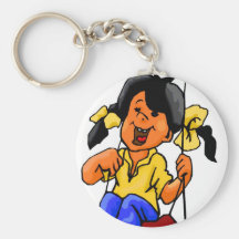 FILLE SUR UNE OSCILLATION PORTE-CLEF