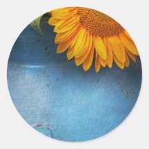 Fleur - tournesol - peu de soleil bleu autocollant rond