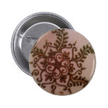 Henné floral avec le bouton de vignes badge
