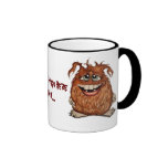 Het monster koestert hier de Mok van de Koffie