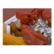 Homard délicieux avec du beurre tiré, la pomme de  carte postale