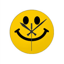 Horloge murale souriante jaune de visage