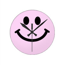 Horloge murale souriante rose de visage