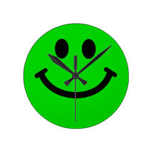Horloge murale souriante verte de visage