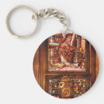 Horloger - une horloge fleurie porte-clef