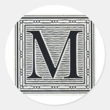 Initiale de bois de graveur de gravure sur bois en adhésifs ronds