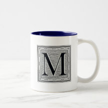 Initiale de bois de graveur de gravure sur bois en tasse à café