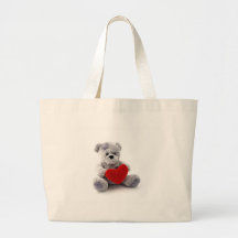 Jouet d'ours de nounours tenant un coeur sur l'arr sacs