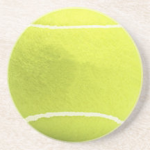 La balle de tennis boit le caboteur dessous de verre