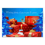 La carte de voeux rouge de cadeaux