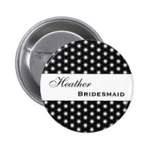 La petite étoile noire et blanche fleurit la demoi badge
