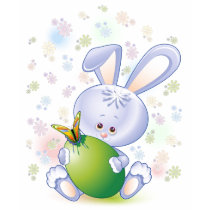 Lapin de Pâques avec l'oeuf et les fleurs